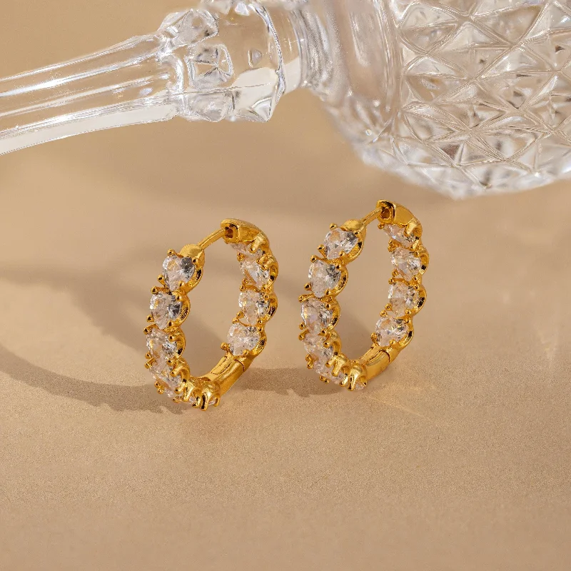 Women’s precious stone earrings-Inside Out Heart Diamond Hoops