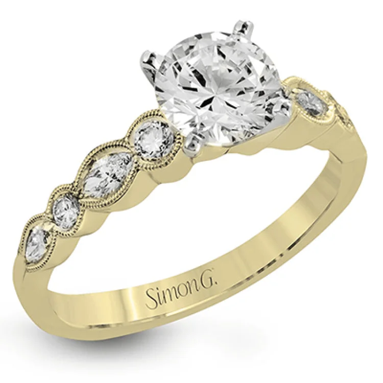 Women’s princess solitaire engagement rings-Classically designed, yet featuring a modern flair, this delicate white gold engagement ring and wedding band set are accentuated with .28 ctw round cut white diamonds and .46 ctw marquise cut diamonds.