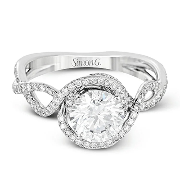 Women’s stackable engagement rings-Classic with a modern twist, this white gold engagement ring features .50 ctw of sparkling white diamonds in a dramatic openwork design.