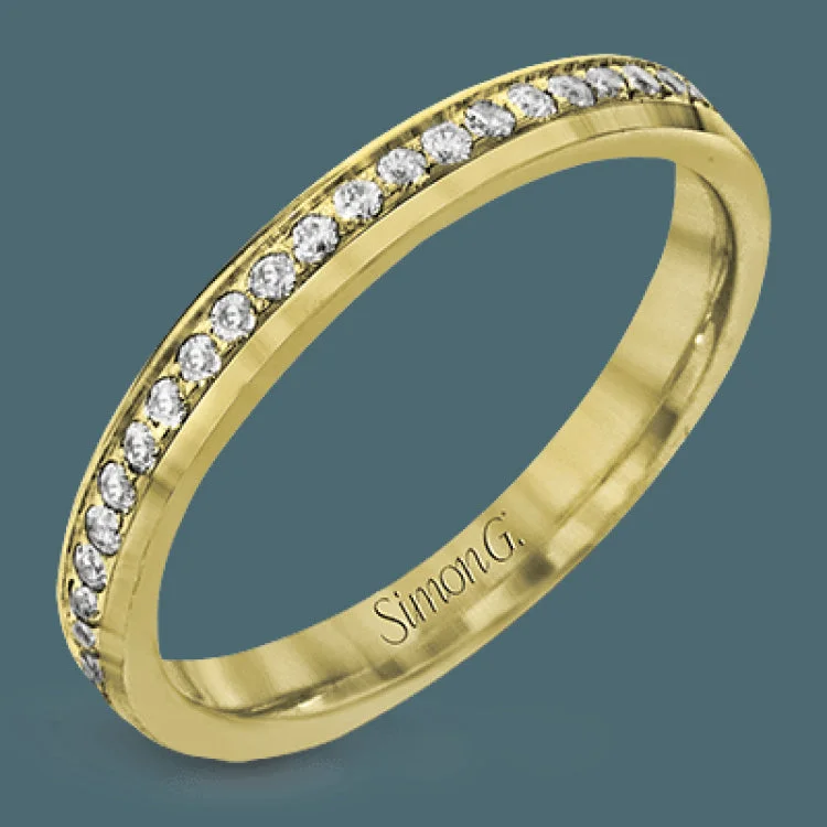 Women’s vintage diamond solitaire engagement rings-This classic wedding band features .27 ctw of white diamonds set in white gold, while the interior of the ring is rose gold.