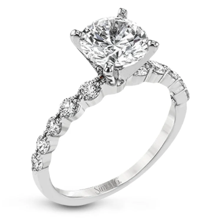 Women’s princess-cut engagement rings-This 18k white gold engagement set certainly makes a statement with 1.72 ctw of white diamonds set in three rows.