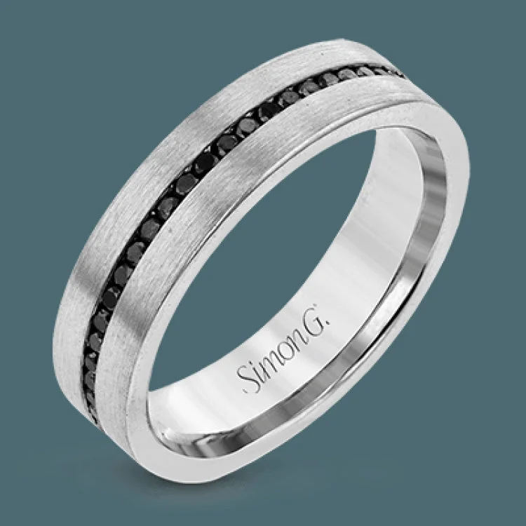 Women’s cushion cut engagement rings-This tasteful, minimalist wedding band in brushed white gold features a subtle sparkle with .58 ctw of black diamonds.