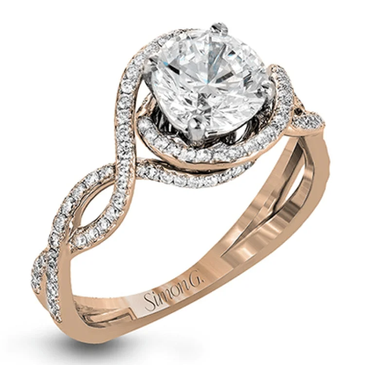 Women’s pear cut engagement rings-Classic with a modern twist, this white gold engagement ring features .50 ctw of sparkling white diamonds in a dramatic openwork design.