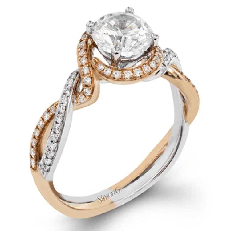 Women’s round solitaire engagement rings-This twisting, two-tone 18k white and yellow gold engagement ring is set with .24 ctw of white round brilliant diamonds.