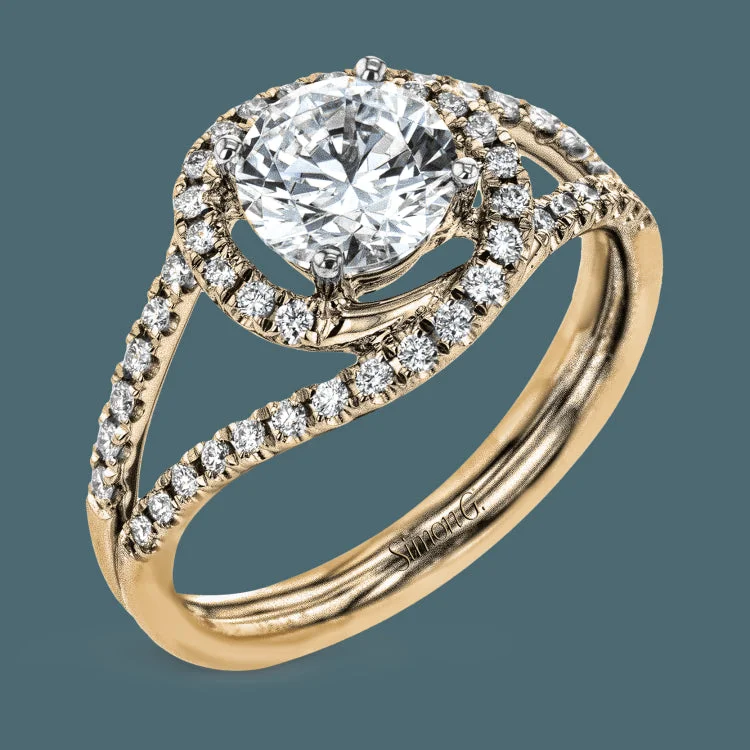 Women’s cushion cut engagement rings-Crafted in the highest quality platinum, this engagement ring design features a two overlapping loops encircling the center stone set with .25 ctw of white diamonds.