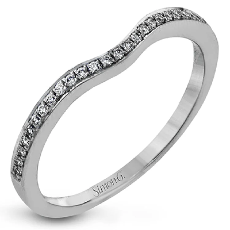 Women’s white gold engagement rings-This white gold engagement ring has a clean, minimalist design punctuated with .17 ctw of round white diamonds.