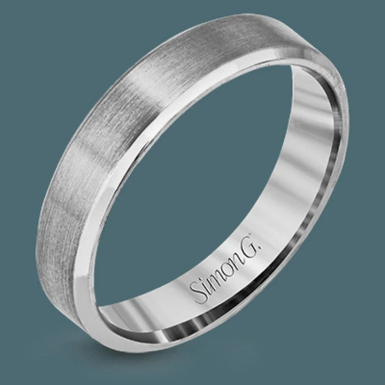 Women’s vintage diamond engagement rings-This simple but elegant men's wedding band in brushed platinum is highlighted by two smooth rims, resulting in a brilliant contemporary design.