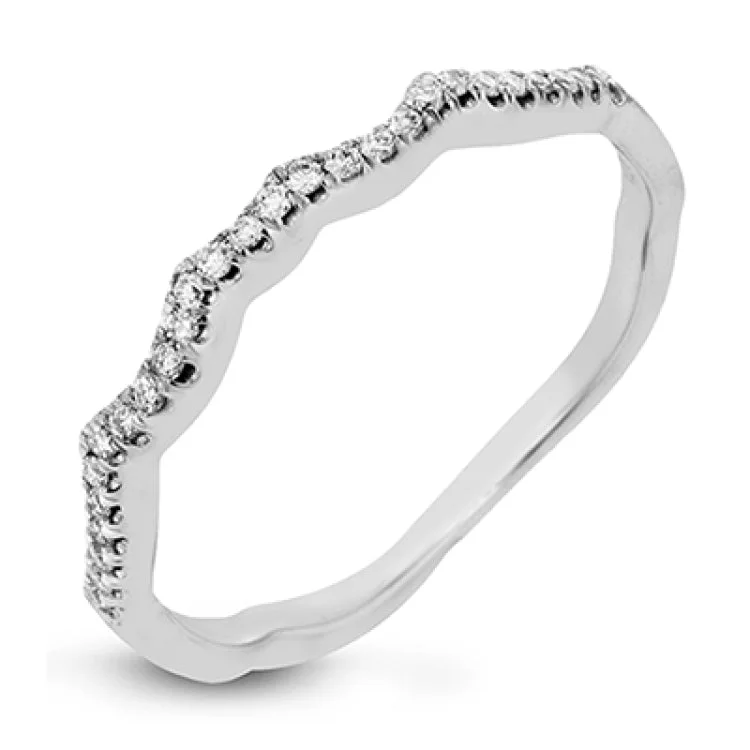 Women’s titanium engagement rings-This impressive contemporary two-tone engagement ring features a unique twisting design on the shank, which is complemented by .17 ctw of round cut white diamonds.