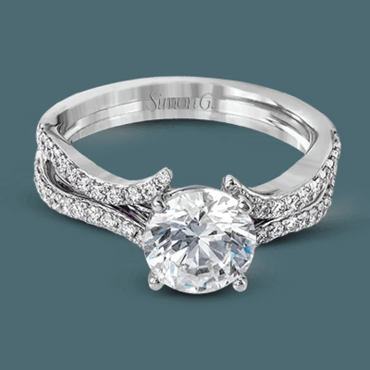 Women’s birthstone engagement rings-Beautiful curves lines make this engagement setting one of the kind. A stunning .41 ctw of white diamonds sparkle on this ring.