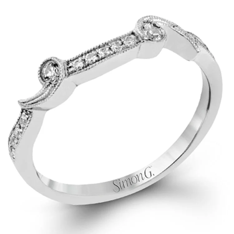 Women’s romantic engagement rings-Featuring an elegant design, this white gold classic engagement ring is accented with .25 ctw round cut white diamonds.