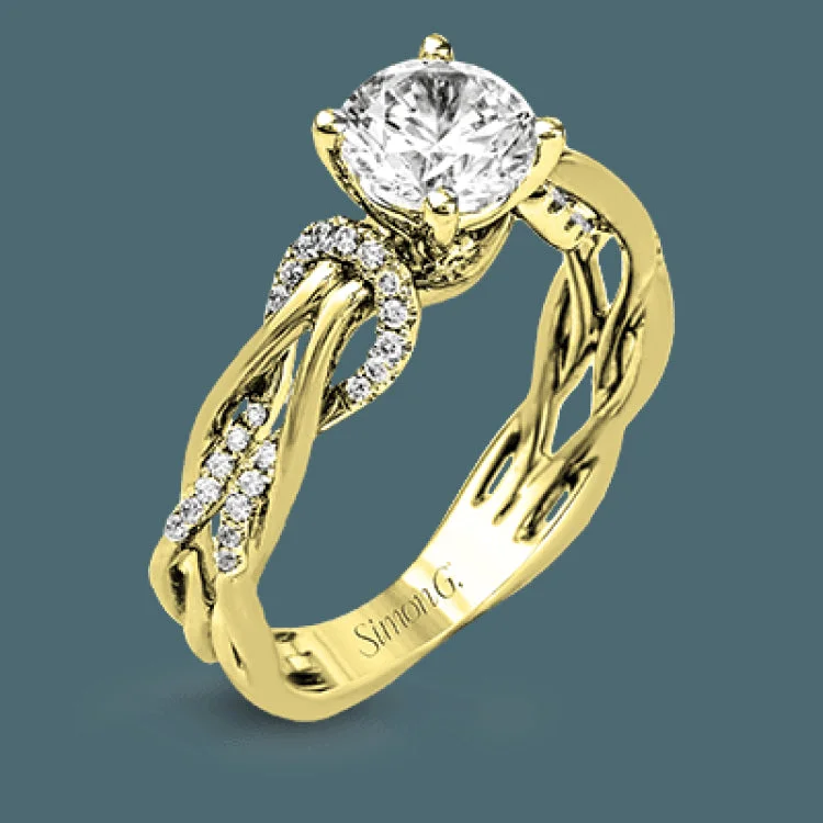 Women’s modern engagement rings-This impressive contemporary two-tone engagement ring features a unique twisting design on the shank, which is complemented by .17 ctw of round cut white diamonds.