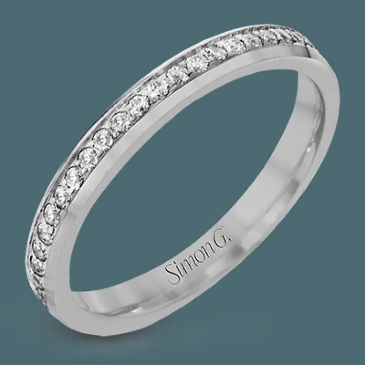 Women’s diamond wedding engagement rings-This classic wedding band features .27 ctw of white diamonds set in white gold, while the interior of the ring is rose gold.