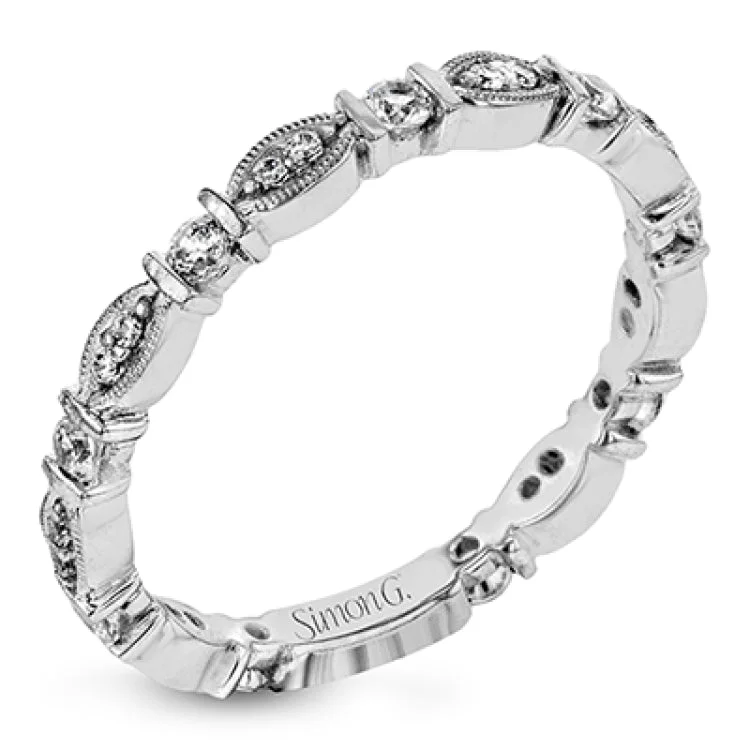 Women’s vintage engagement rings-This 18k white gold band is perfect for layering with others, or could also be used unique wedding band, and contains .31 ctw of white diamonds. Perfect for stacking.