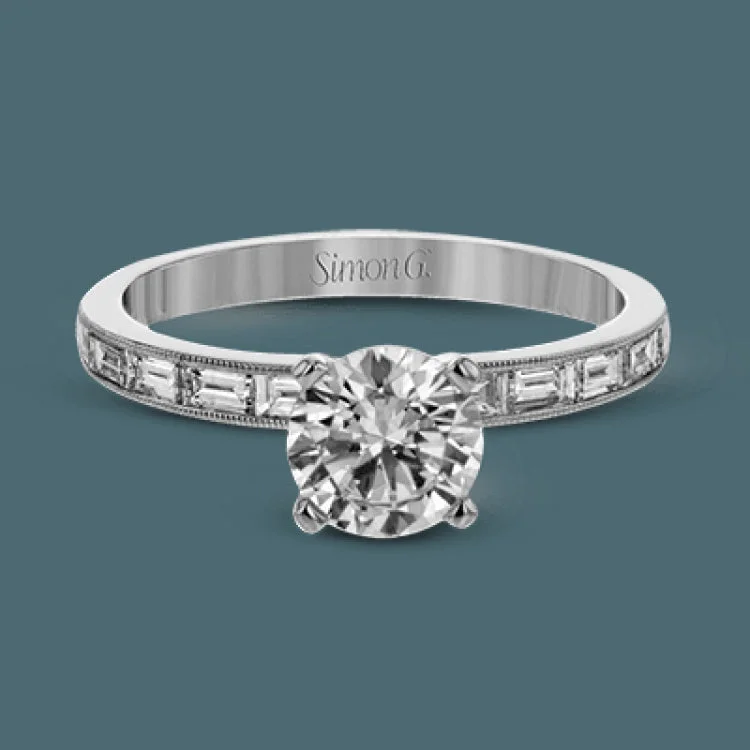 Women’s platinum halo engagement rings-This sleek, minimalist white gold wedding set features a distinctive design with an impressive 1.05 ctw of baguette shaped white diamonds.