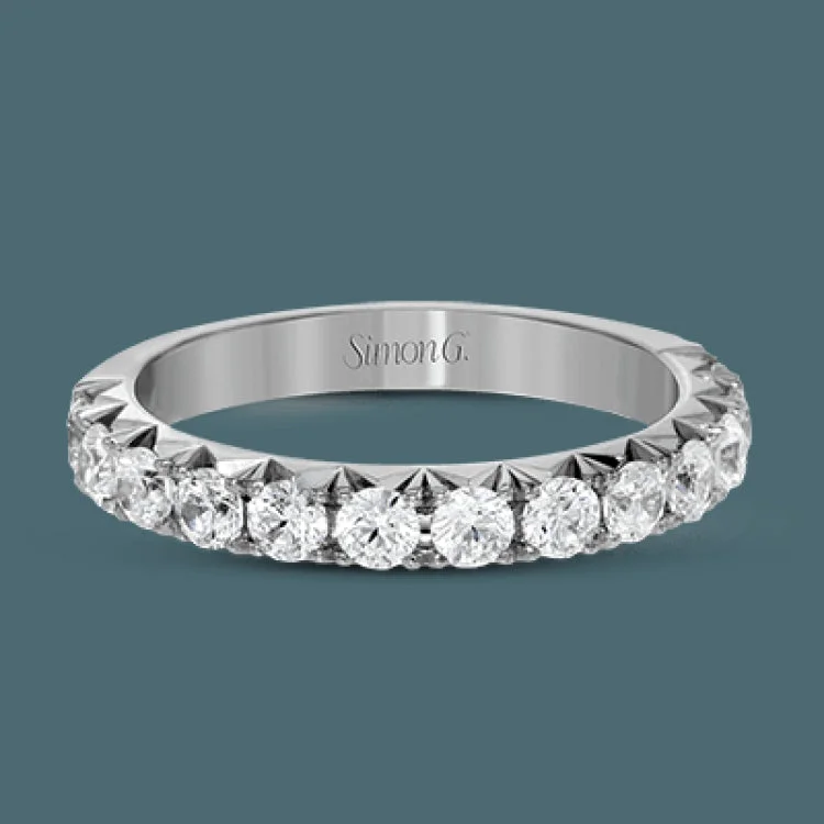 Women’s art deco engagement rings-This band pairs perfectly with an engagement ring, or can be worn on its own or stacked with other rings. It contains .75 ctw of white diamonds.