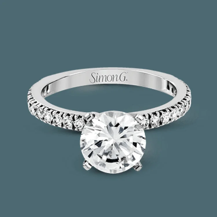 Women’s vintage diamond engagement rings-This beautiful 18k white gold wedding set contains a stunning .75 ctw of white round brilliant diamonds.