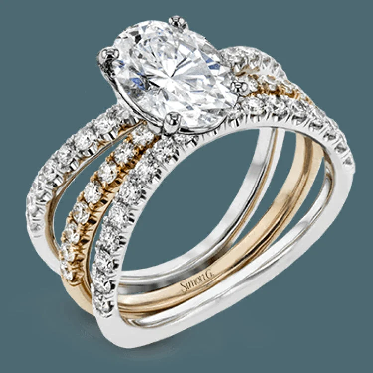 Women’s princess diamond engagement rings-This distinctive bridal set design features a double-layer wedding band that fits around the engagement ring. The set contains .77 ctw of white diamonds.