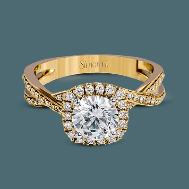 Women’s stackable wedding rings-This sparkling modern engagement ring features an eye-catching twisted design with elegant classic halo accented by .29 ctw of shimmering round cut white diamonds.