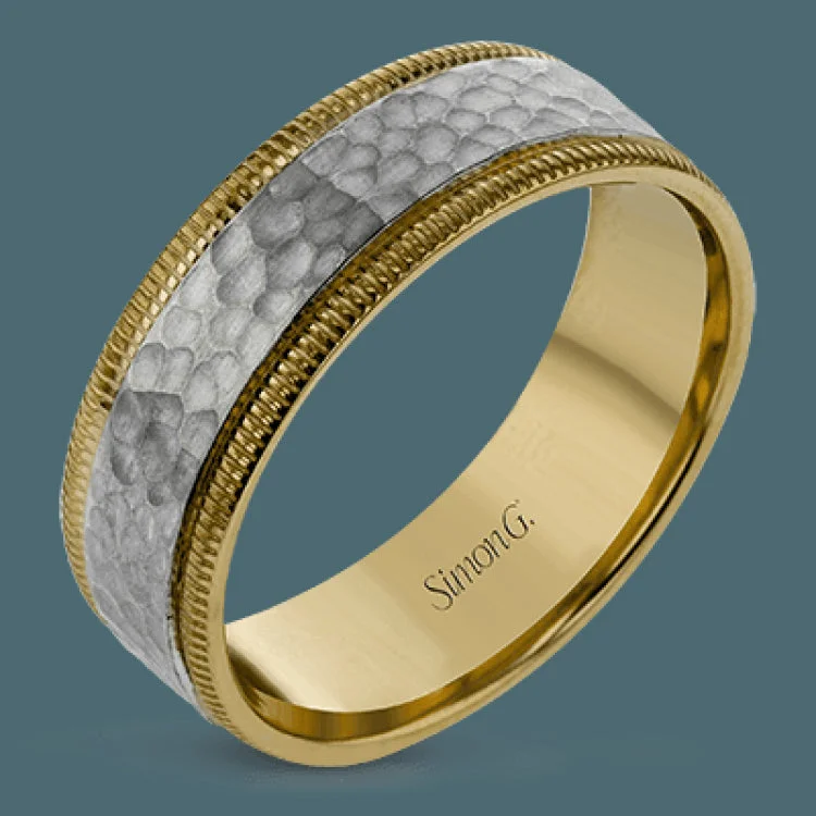 Women’s gold three-stone engagement rings-This stunning contemporary platinum men's wedding band features a hammered center column outlined dual milgrain edges for an eye-catching design.