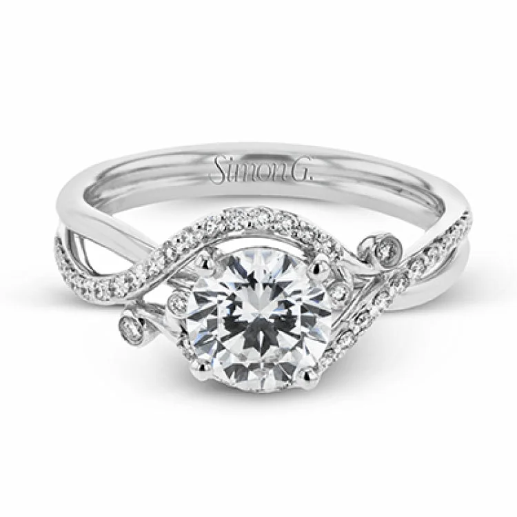 Women’s diamond eternity bands-This nature inspired 18K engagement ring has a simple twist design with a combination of high polish gold band and .20 ctw RD diamonds leading up to the center