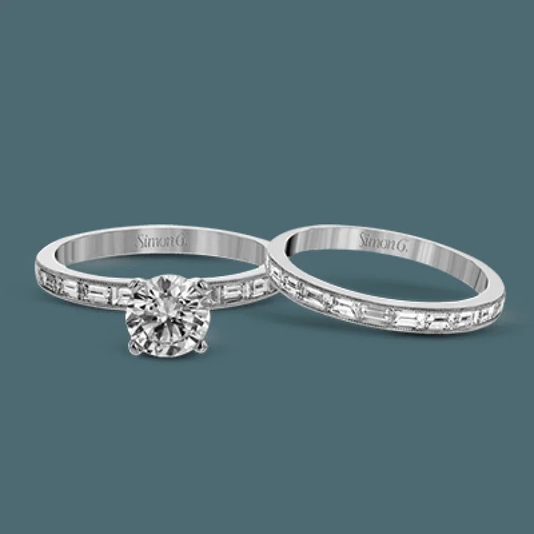 Women’s sapphire engagement rings with diamonds-This sleek, minimalist white gold wedding set features a distinctive design with an impressive 1.05 ctw of baguette shaped white diamonds.