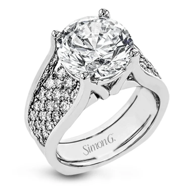 Women’s unique diamond engagement rings-This engagement ring sure is a stunner with a wide band set with a full 1.20 ctw of white diamonds.