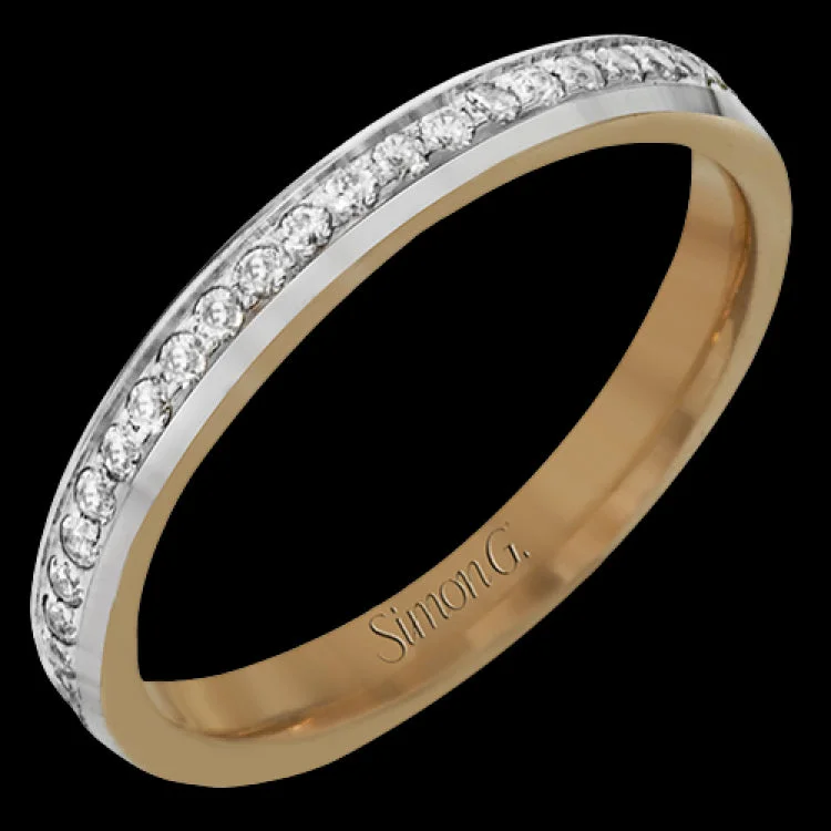 Women’s white gold engagement rings-This classic wedding band features .27 ctw of white diamonds set in white gold, while the interior of the ring is rose gold.