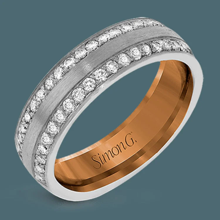 Women’s classic engagement rings-This two-tone 14k wedding band is a stunner with two rows of .50 ctw of white diamond set in rose gold along the outside, and 14k white gold on the interior.