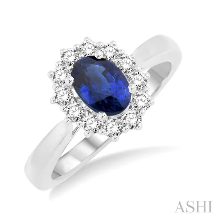 Women’s blue diamond engagement rings-7X5mm Oval Shape Sapphire and 1/3 Ctw Round Cut Diamond Ring in 14K White Gold