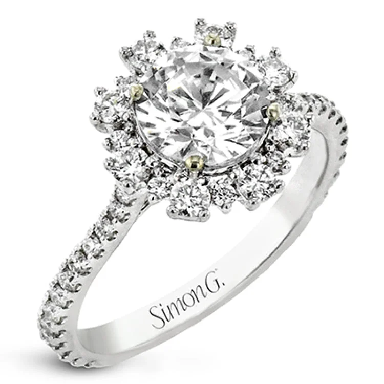 Women’s stackable wedding rings-From our Super nova collection this 18K engagement ring is a unique take on the classic halo ring, and features 0.60 ctw of round diamonds