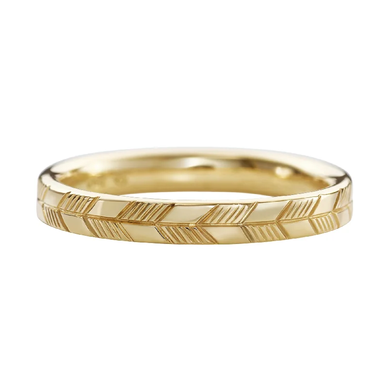 Women’s diamond eternity rings-Golden Wedding Band with an Abstract Feather Engraving