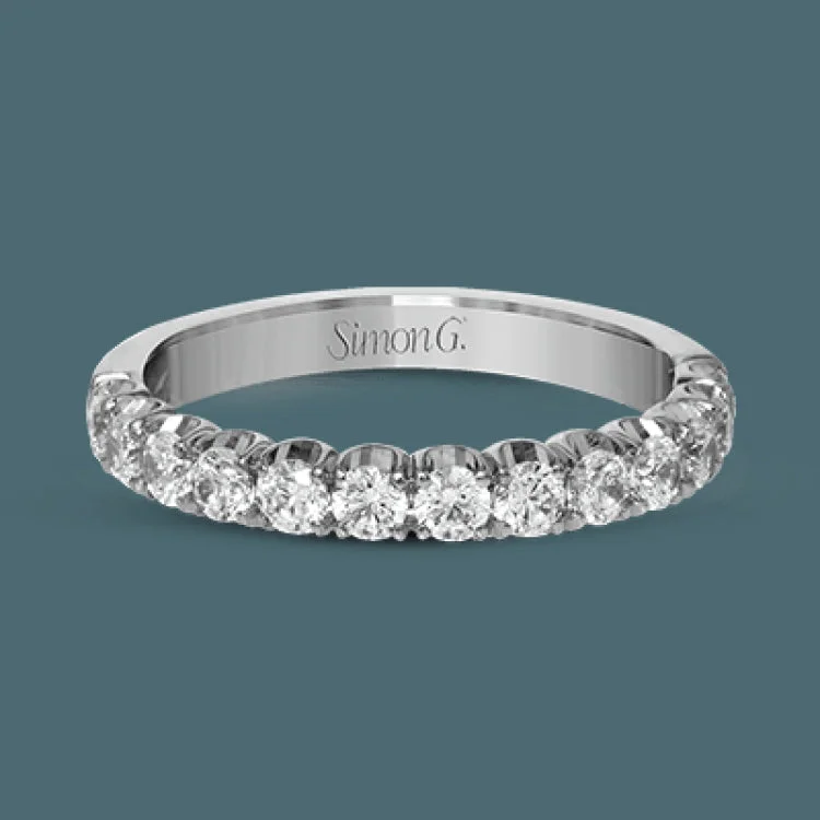 Women’s moissanite solitaire engagement rings-This classic wedding band contains a stunning 1.00 ctw of white round diamonds