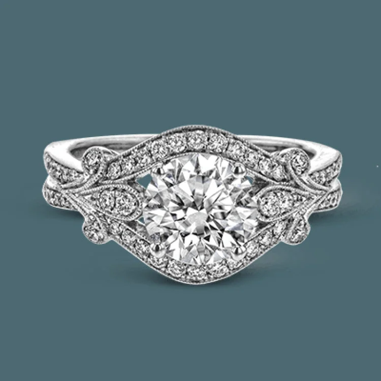 Women’s stackable engagement rings-This absolutely exquisite white gold engagement ring dazzles the eye with .38 ctw of round white diamonds in a glamorous, vintage-inspired setting.