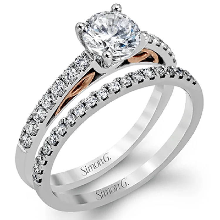 Women’s white gold engagement rings-This classically designed 18k white gold wedding set is highlighted by rose gold accents and .45 ctw of round white diamonds.