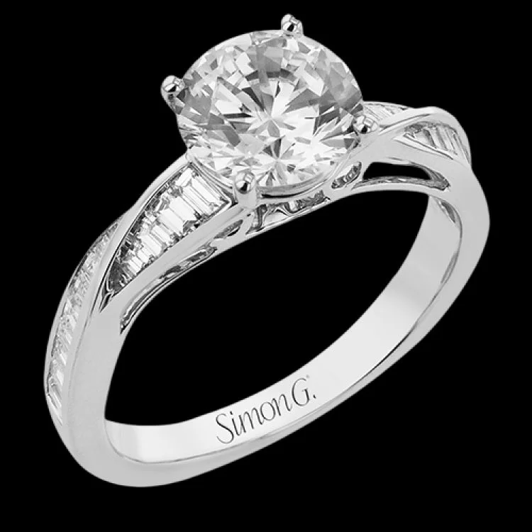 Women’s halo engagement rings with diamonds-This twist engagement ring in 18 kt white gold takes a 1.5 ctw center, and features tapered baguette sides 0.52 ctw.