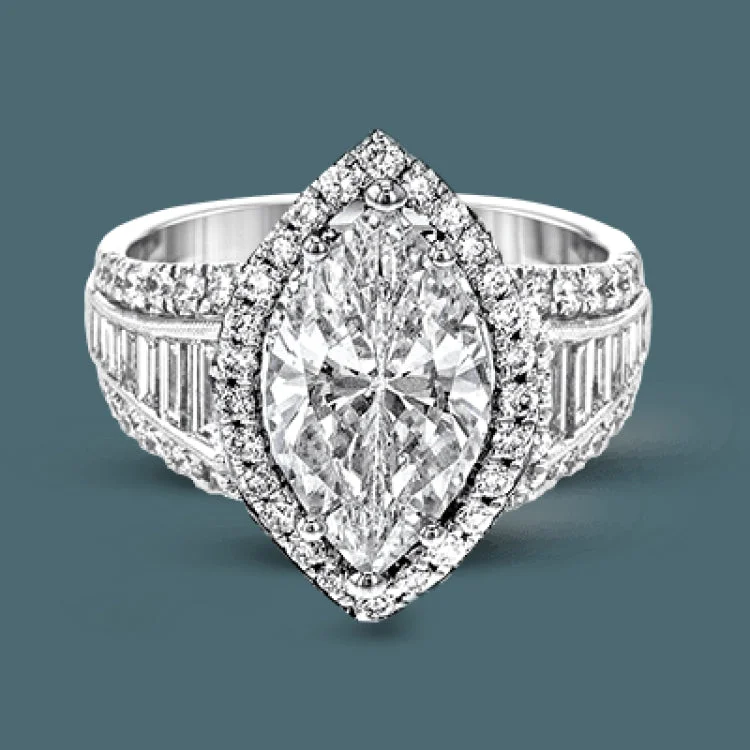 Women’s platinum solitaire engagement rings-This gorgeous engagement ring makes quite the appearance with .83 ctw of round diamonds along with .83 ctw of baguette diamonds.