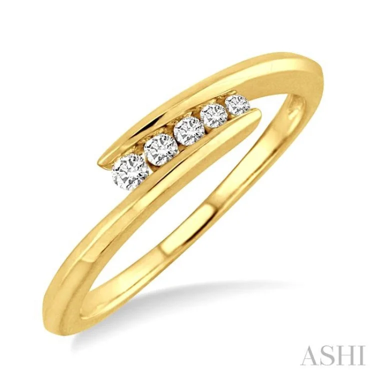 Women’s trendy engagement rings-1/10 Ctw Round Cut Diamond Journey Ring in 10K Yellow Gold