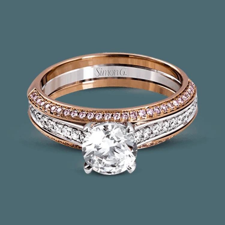 Women’s blue diamond engagement rings-An exquisite statement, this engagement ring features .23 ctw of white diamonds in 18k white gold through the center, bordered by .25 ctw on pink diamonds set into 18k rose gold.