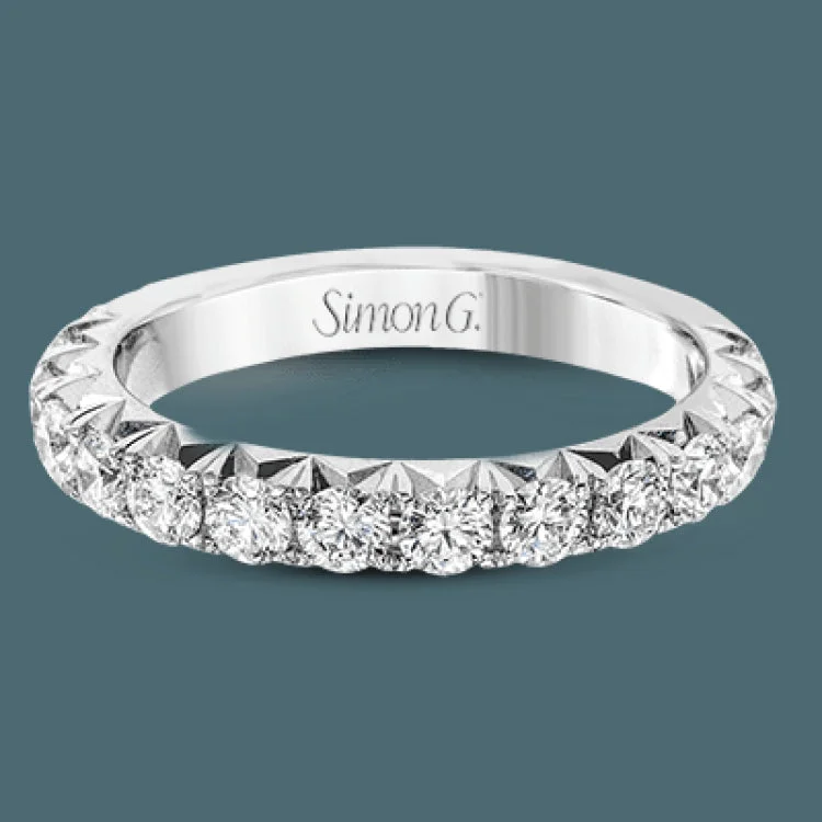 Women’s antique diamond engagement rings-This band pairs perfectly with an engagement ring, or can be worn on its own or stacked with other rings. It contains 1.00 ctw of white diamonds.