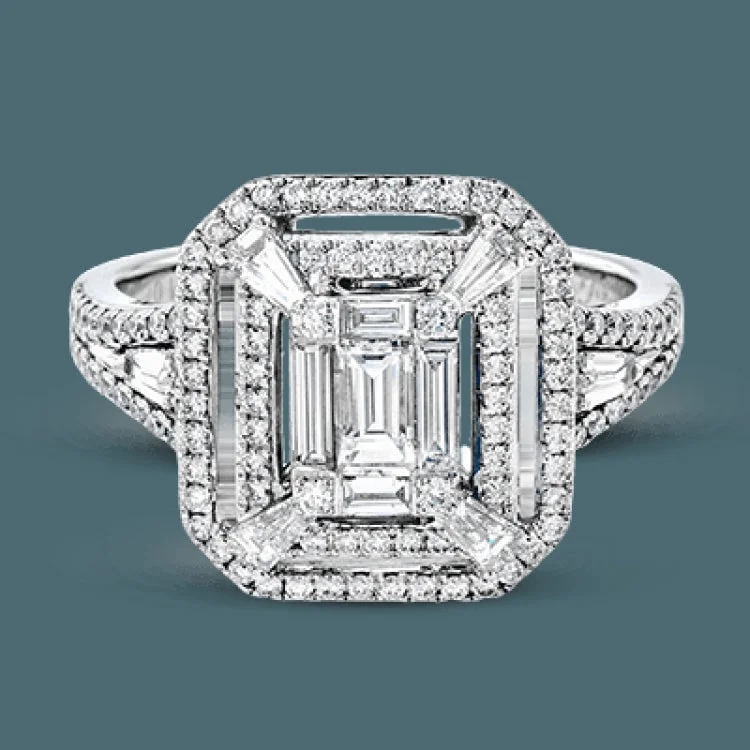 Women’s radiant cut engagement rings-Reflecting an eye-catching modern design, this white gold engagement ring is emphasized by .39 ctw of round white diamonds and .64 ctw baguette cut white diamonds.