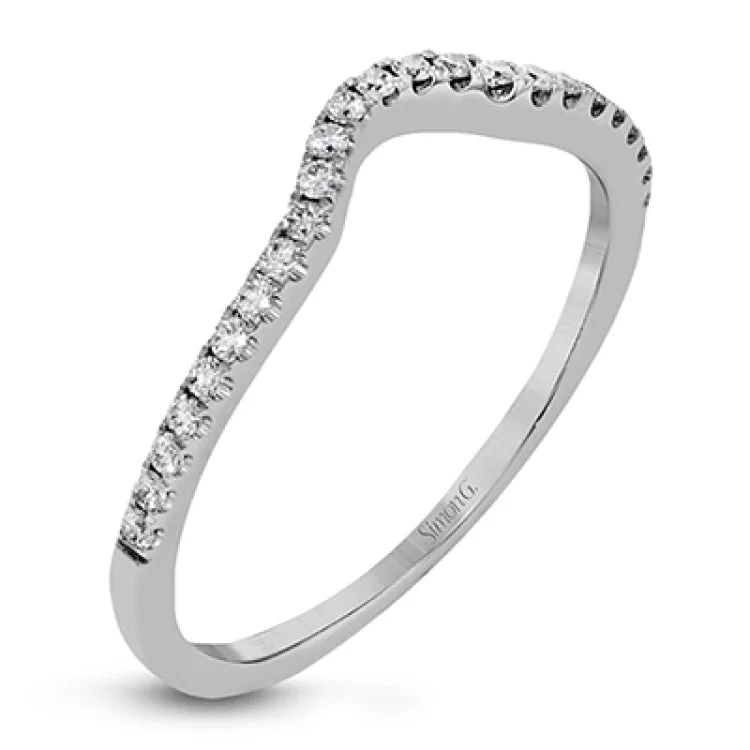 Women’s fine diamond engagement rings-Featuring a pear-shaped double halo, this modern white gold engagement ring is highlighted by .68 ctw of round cut white diamonds.