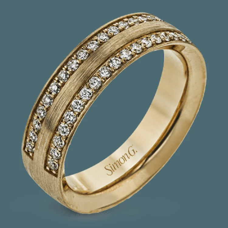 Women’s titanium engagement rings-This two-tone 14k wedding band is a stunner with two rows of .50 ctw of white diamond set in rose gold along the outside, and 14k white gold on the interior.