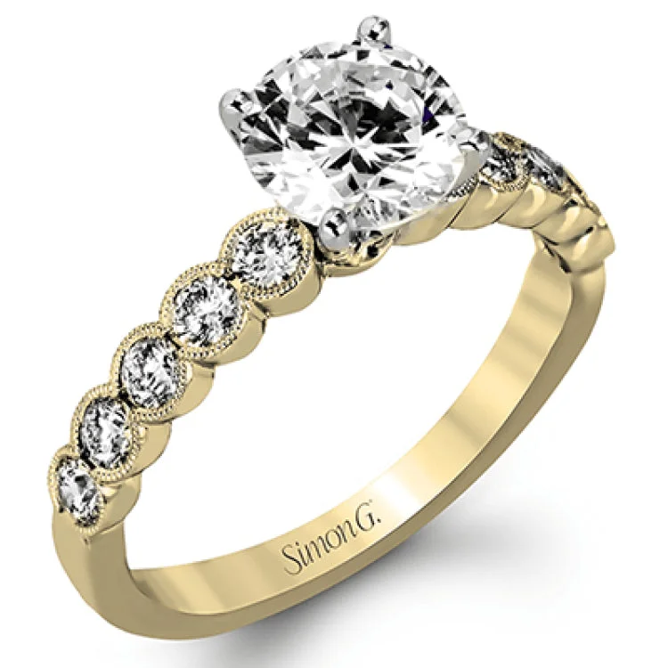 Women’s unique moissanite engagement rings-This engagement and wedding band set combines old and new with 1.09 ctw of round brilliant diamonds bezel set into 18k white gold, accented with vintage-inspired milgrain.