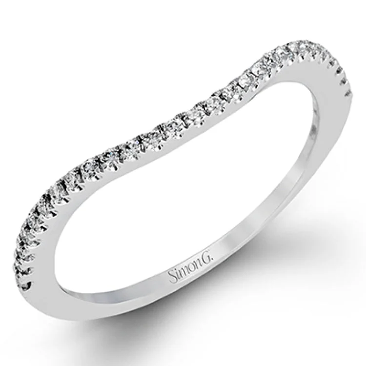 Women’s modern engagement rings-This lovely contemporary styled white gold engagement ring features a dazzling setting of .66 ctw of round cut white diamonds.