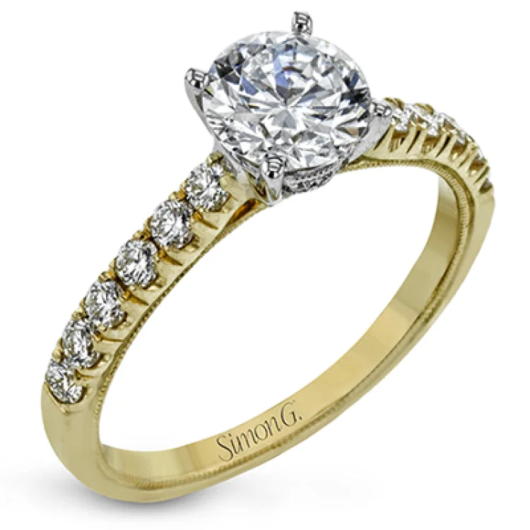 Women’s platinum halo engagement rings-This classic 18k gold engagement ring setting contains .37 ctw of sparkling white diamonds.