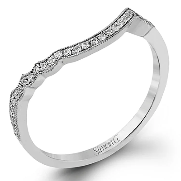 Women’s affordable engagement rings-This lovely modern white gold engagement ring features a memorable halo and is accentuated by .19 ctw glistening round cut white diamonds.