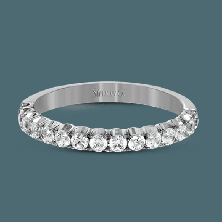 Women’s forever one engagement rings-This classic wedding band contains a stunning .50 ctw of white round diamonds