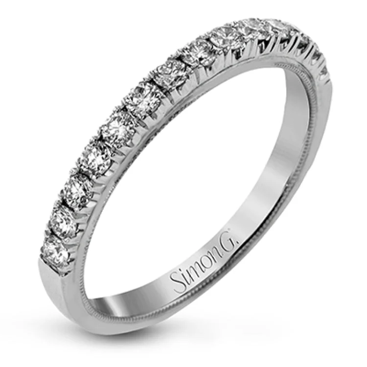 Women’s titanium engagement rings-This classic 18k gold engagement ring setting contains .37 ctw of sparkling white diamonds.