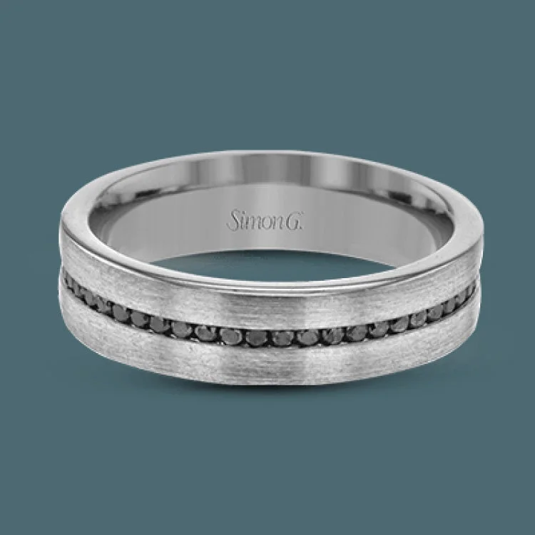 Women’s trendy engagement rings-This tasteful, minimalist wedding band in brushed white gold features a subtle sparkle with .58 ctw of black diamonds.