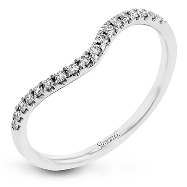 Women’s wedding and engagement rings-Crafted in the highest quality platinum, this engagement ring design features a two overlapping loops encircling the center stone set with .25 ctw of white diamonds.